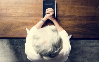 Senior woman prayer faith in christianity religion