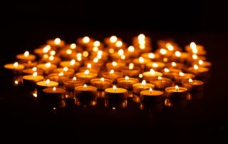 Candles burning in the night.